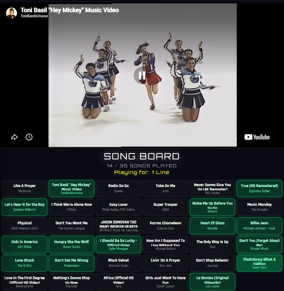 The Music Bingo big screen playing a music video above the song board, showing fourteen of thirty-five songs played